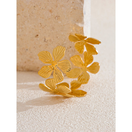 Golden Petal Cascade Floral Cuff Bracelet